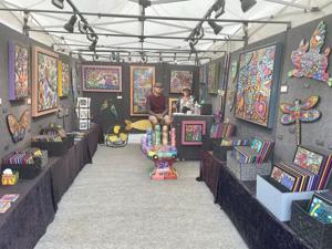 Behind the booths: Meet the non-musical artists who make the trek to Bluegrass each year
