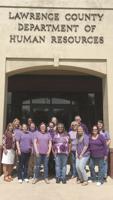 Lawrence DHR dress in purple in  observance of Elder Abuse Awareness
