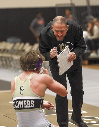 Coach Scarbor encourages Russell Flowers