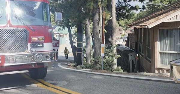 Woman, child rescued from flipped vehicle