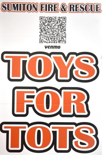 Total Tots Sign Sumiton Toys for Tots raising funds for Dec. 20 event | News ...
