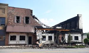 Massive fire destroys downtown office building, damages others