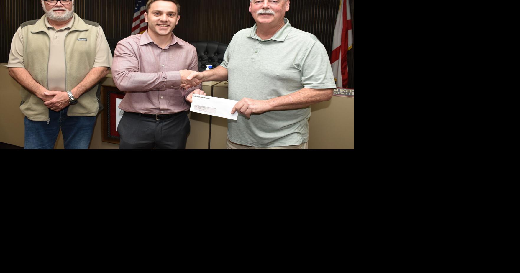 Kinder gives donations to commission, community action agency News