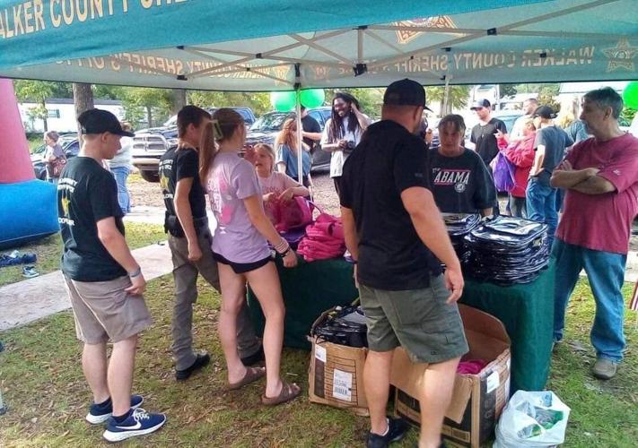 Sheriff's Neighborhood Watch holds Nauvoo BacktoSchool event News