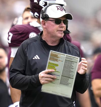 A dozen years after scandal, Petrino back at Arkansas to run offense