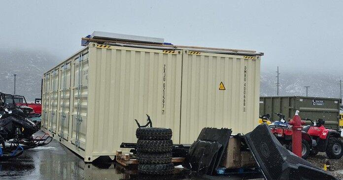 Karl Malone hopes to keep four shipping containers at dealership