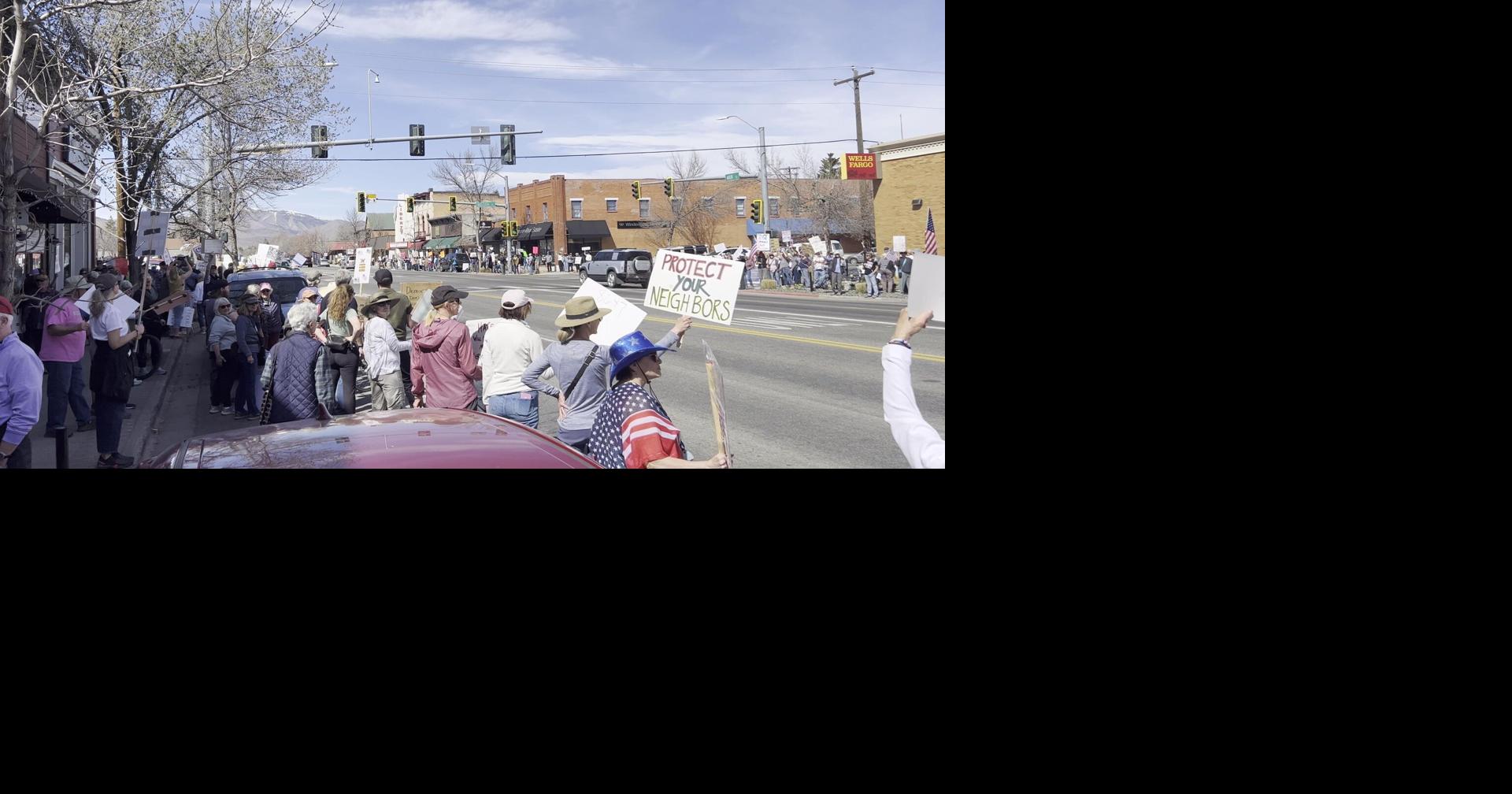 Protesters fill Hailey park, intersection for rally against Trump