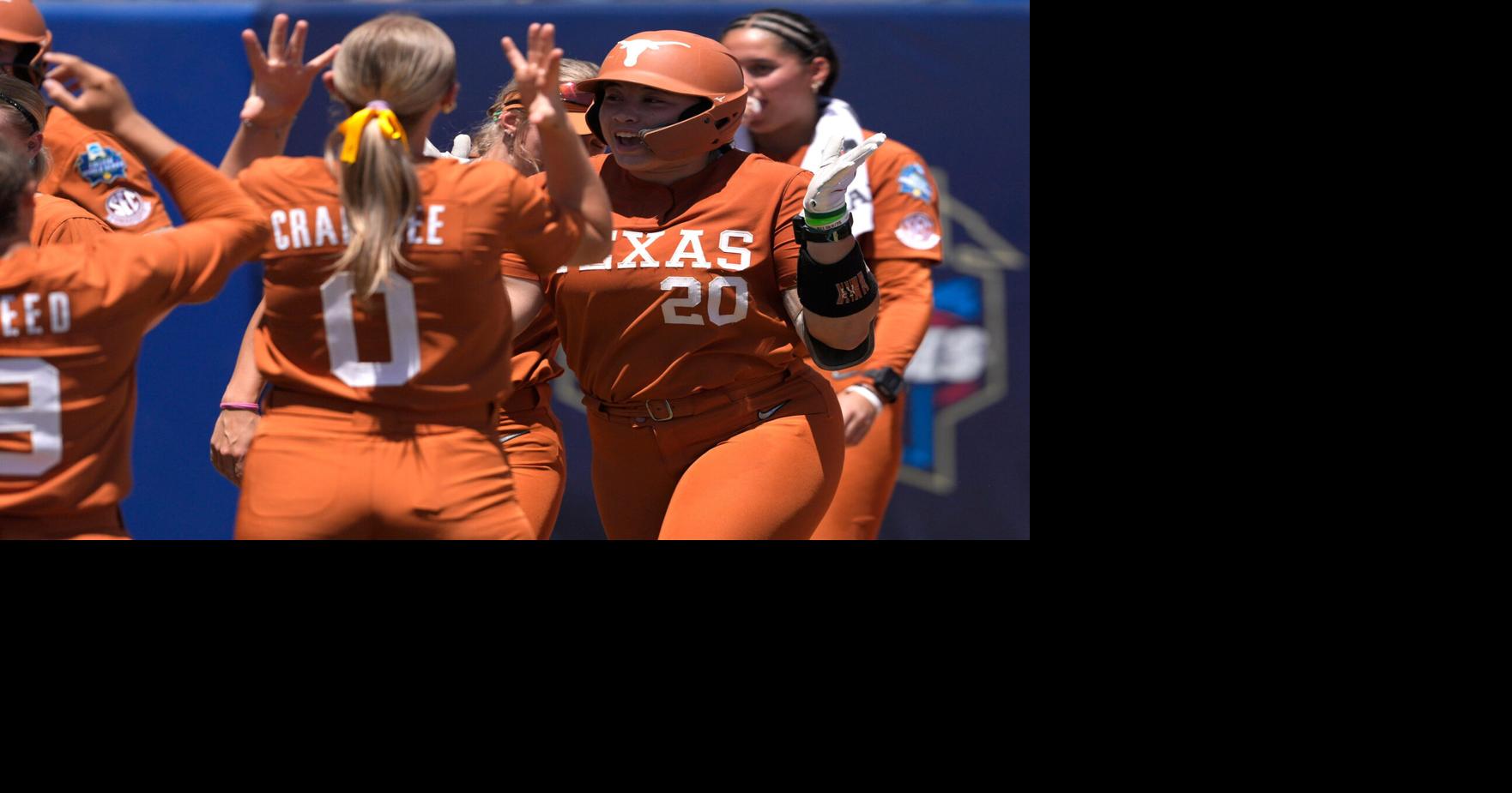 Texas Longhorns utility Katie Stewart (20) celebrates after hitting a home run in the fifth inning of a Women's College World Series softball game between the University of Texas Longhorns and the Tennessee Lady Volunteers at Devon Park in Oklahoma City, M
