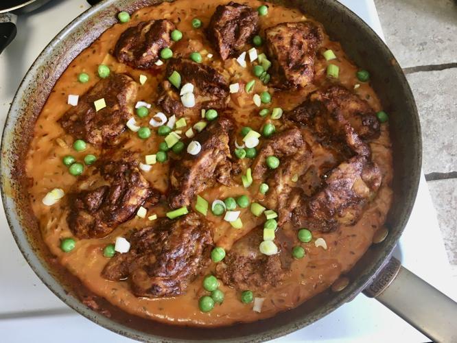 Coconut milk smooths, sweetens chicken thigh curry