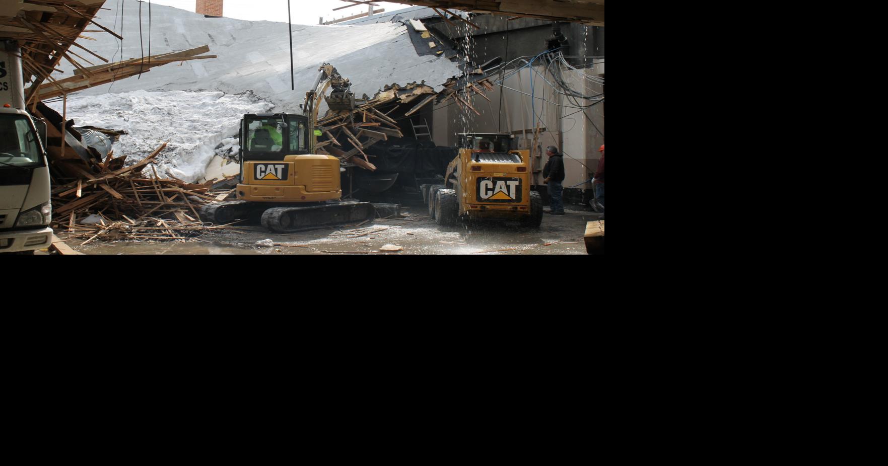 Work under way on collapsed warehouse building in Uptown Butte