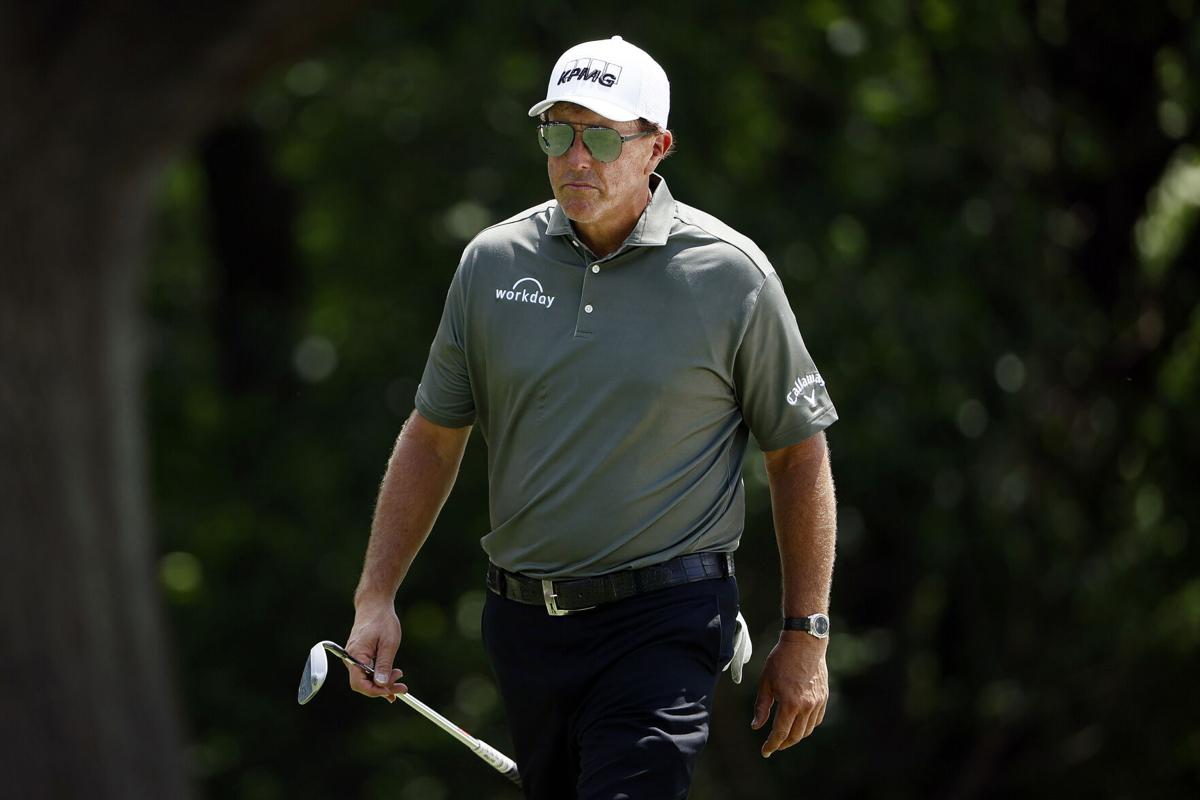 Phil Mickelson walks on the fifth hole during the first round of the Charles Schwab Challenge at Colonial Country Club on May 27, 2021 in Fort Worth, Texas.