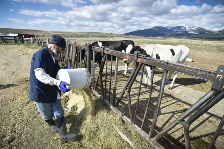 Inmate Mark McGuire feeds a small group