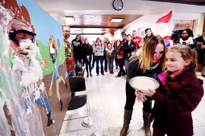 Tech students and faculty participate in pie-in-the-face fundraiser