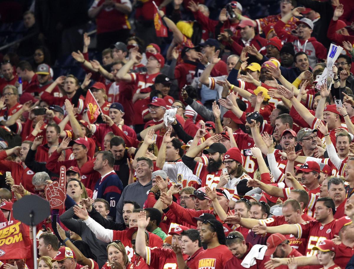 Kansas City Chiefs fans tomahawk-chop as time runs off of the clock against the Houston Texans during the AFC Wild Card game on Saturday, Jan. 9, 2016, at NRG Stadium in Houston.
