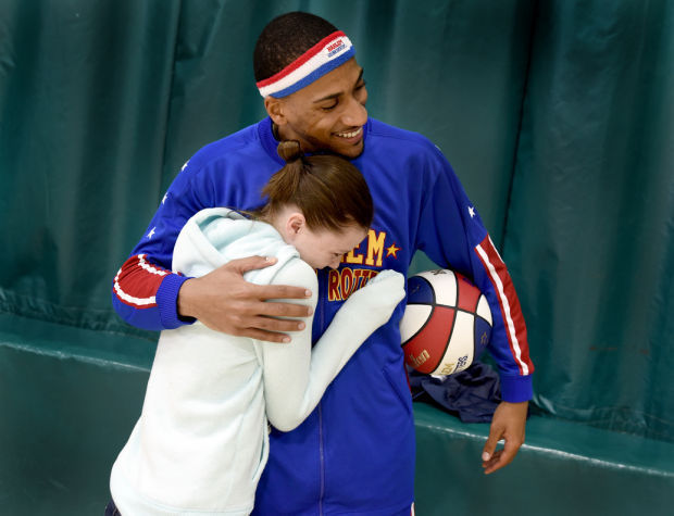 Former Harlem Globetrotter brings 'Stand Tall Against Bullying' campaign to  Martinsville students