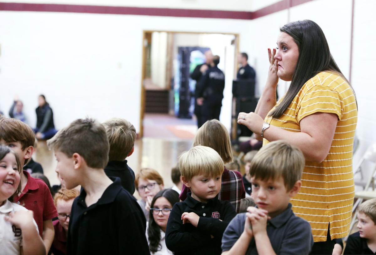 Reflecting on scary events, children and teachers gather for support
