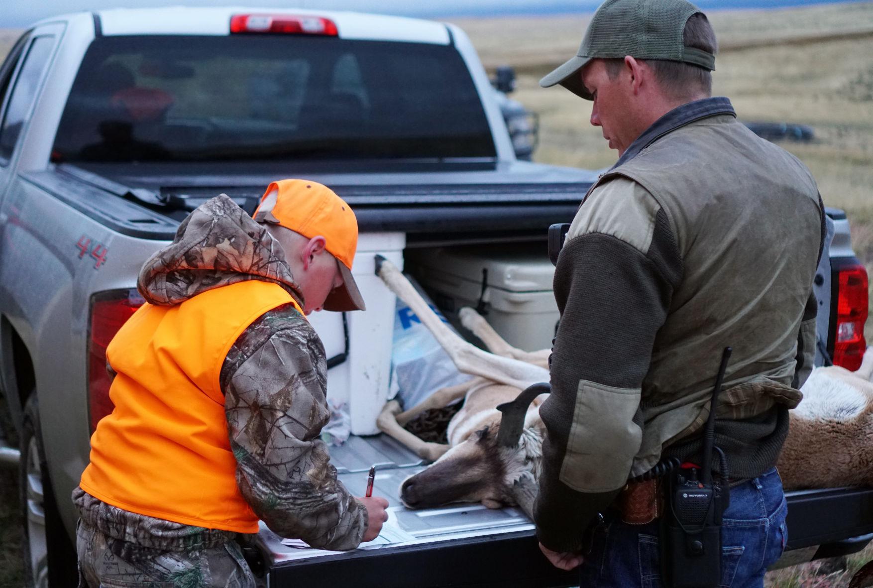 Wyoming game warden's opening day includes salutations, citations