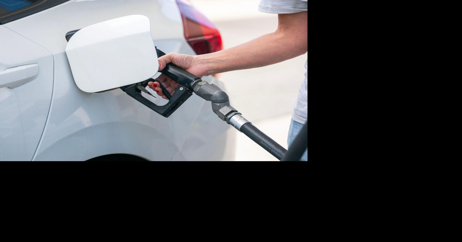 A woman pumps her gas at the Valero gas station which has been turned into a Freedom Fuel, offering Unlead gas for $3.47 a