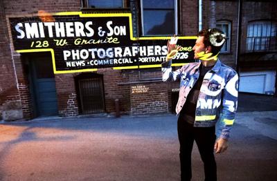 Projection artist brings ghost signs to life in Uptown Butte