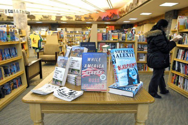 A customer browses at Fact and Fiction
