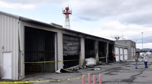 Garage fire at Bert Mooney Airport destroys de-icing trucks