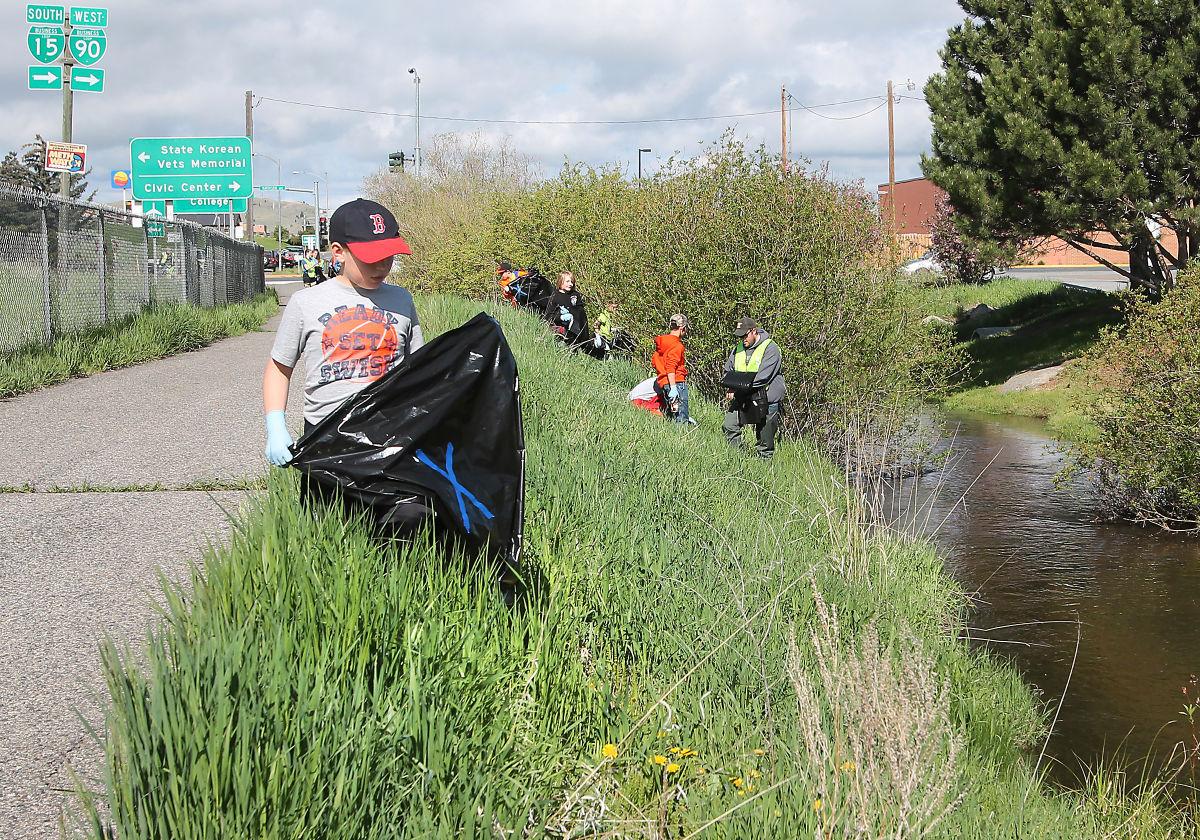 It takes a village to clean up a creek Local