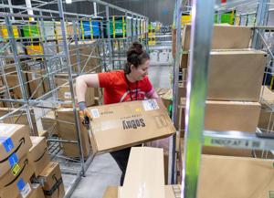 Gianforte, Strohmaier tour massive new Amazon warehouse in Missoula