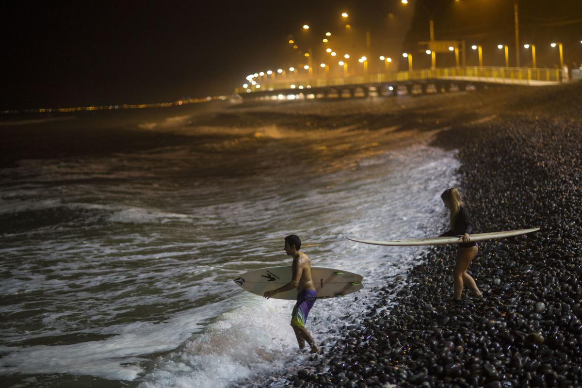 Photos Night surfing in Lima, Peru World News
