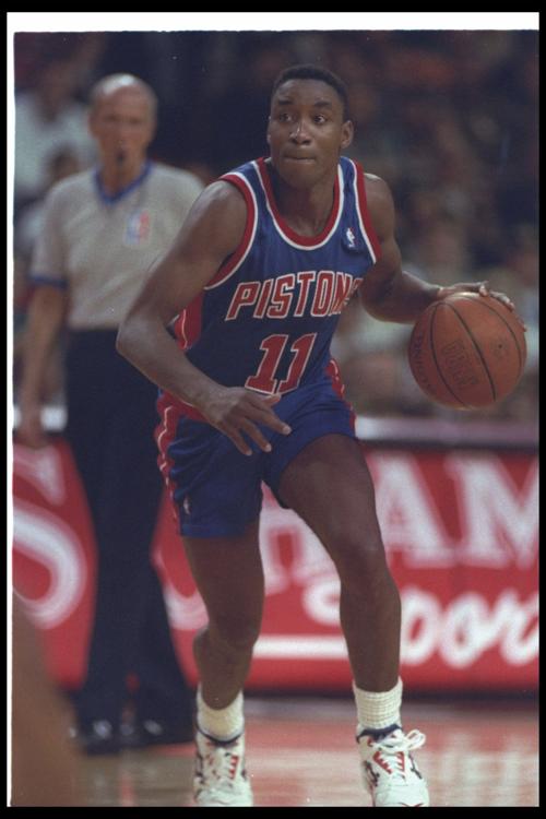 Detroit Pistons guard Isiah Thomas (11) moves the ball during a game against the Chicago Bulls at the United Center in Chicago on April 20, 1993.