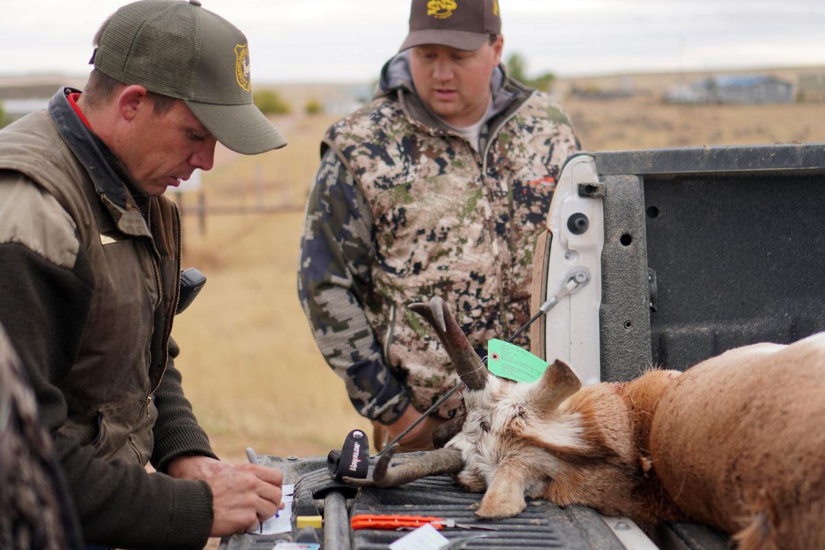 Wyoming game warden's opening day includes salutations, citations