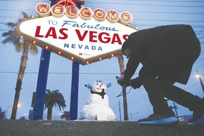 Snowman Pops Up In Vegas As City Sees Rare Winter Weather
