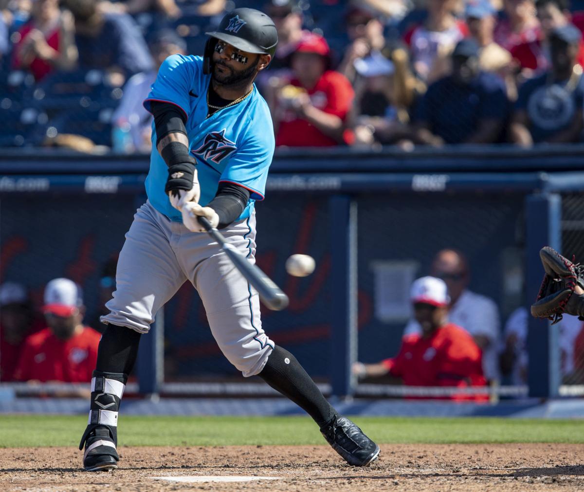 Miami Marlins center fielder Jonathan Villar (2) swings at a pitch during the fourth inning of a Spring Training game against the Washington Nationals at FITTEAM Ballpark of the Palm Beaches Monday, March 2, 2020 in West Palm Beach, Fla.