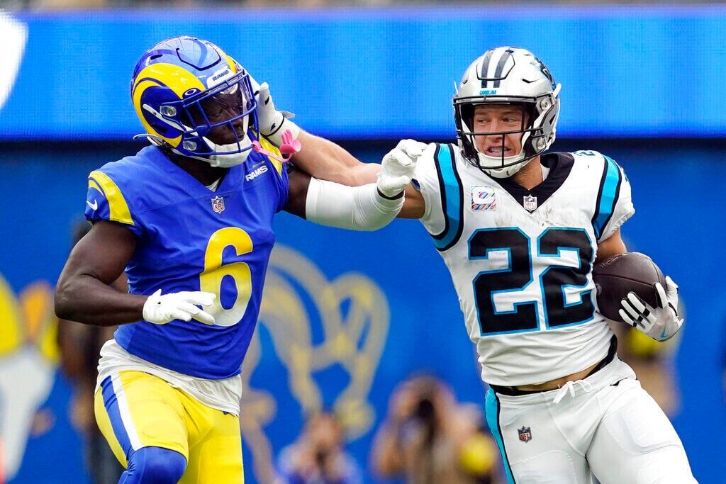 Carolina Panthers running back Christian McCaffrey (22) runs off the field  after a play during the second half of an NFL football game against the  Carolina Panthers in Detroit, Michigan USA, on