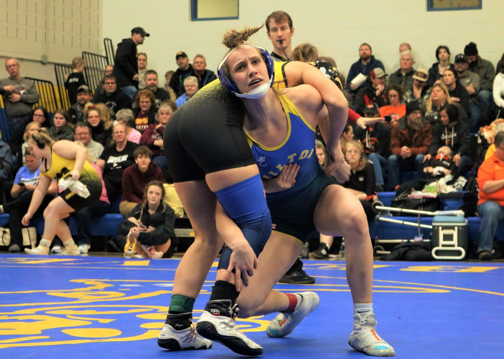 Wilton duo wins titles on home mat Wapello s Wolford wins too