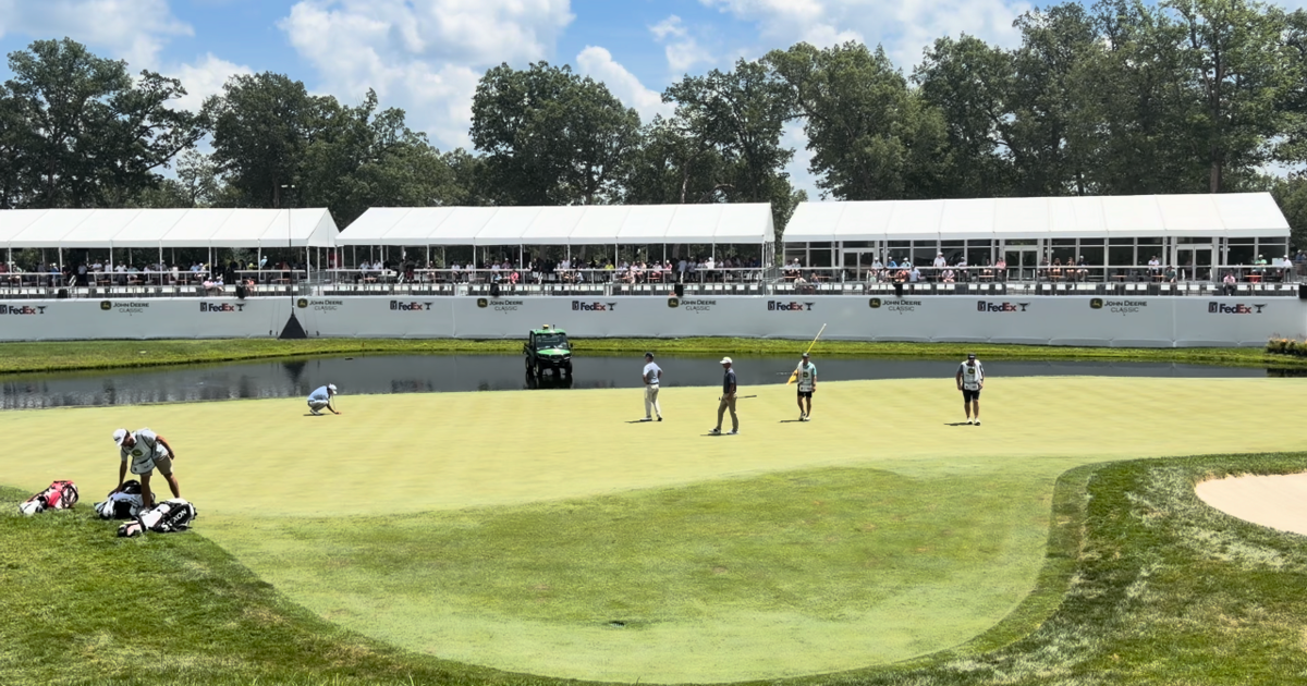 Scenes from the 18th hole at TPC Deere Run
