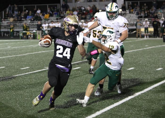 COFOOTBALL PLAYERS OF THE YEAR Cozad, DeLong bonded by craft