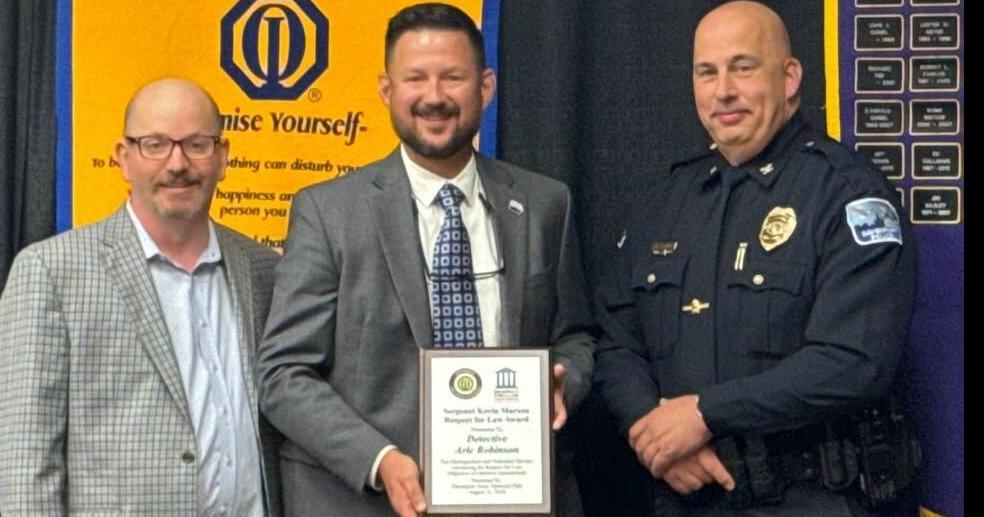 Davenport police detective Aric Robinson receives Noon Optimist Respect for Law Award