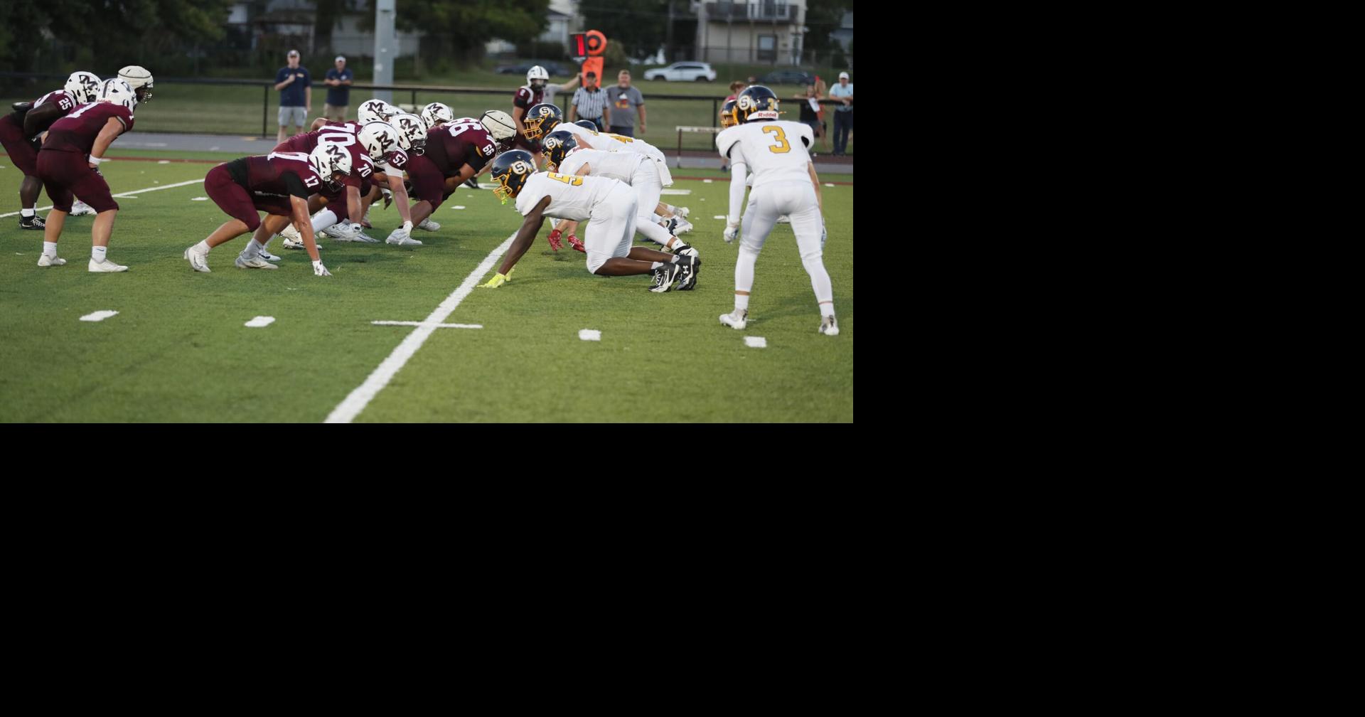 25 images of the Moline Maroons-Sterling Golden Warriors football game