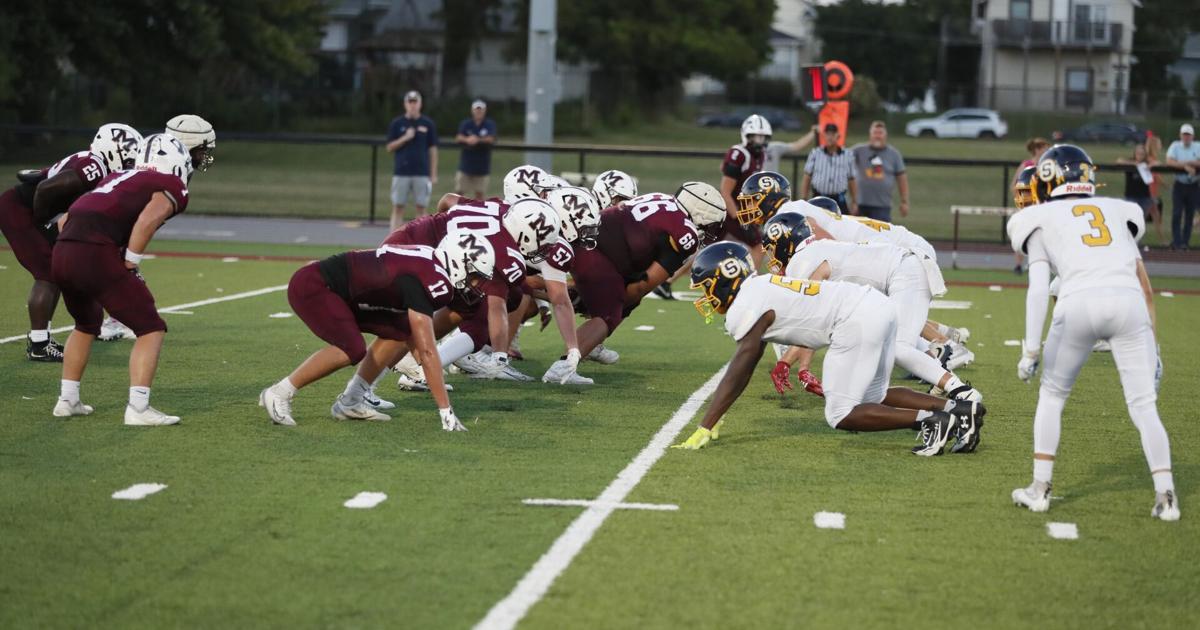 25 images of the Moline Maroons-Sterling Golden Warriors football game