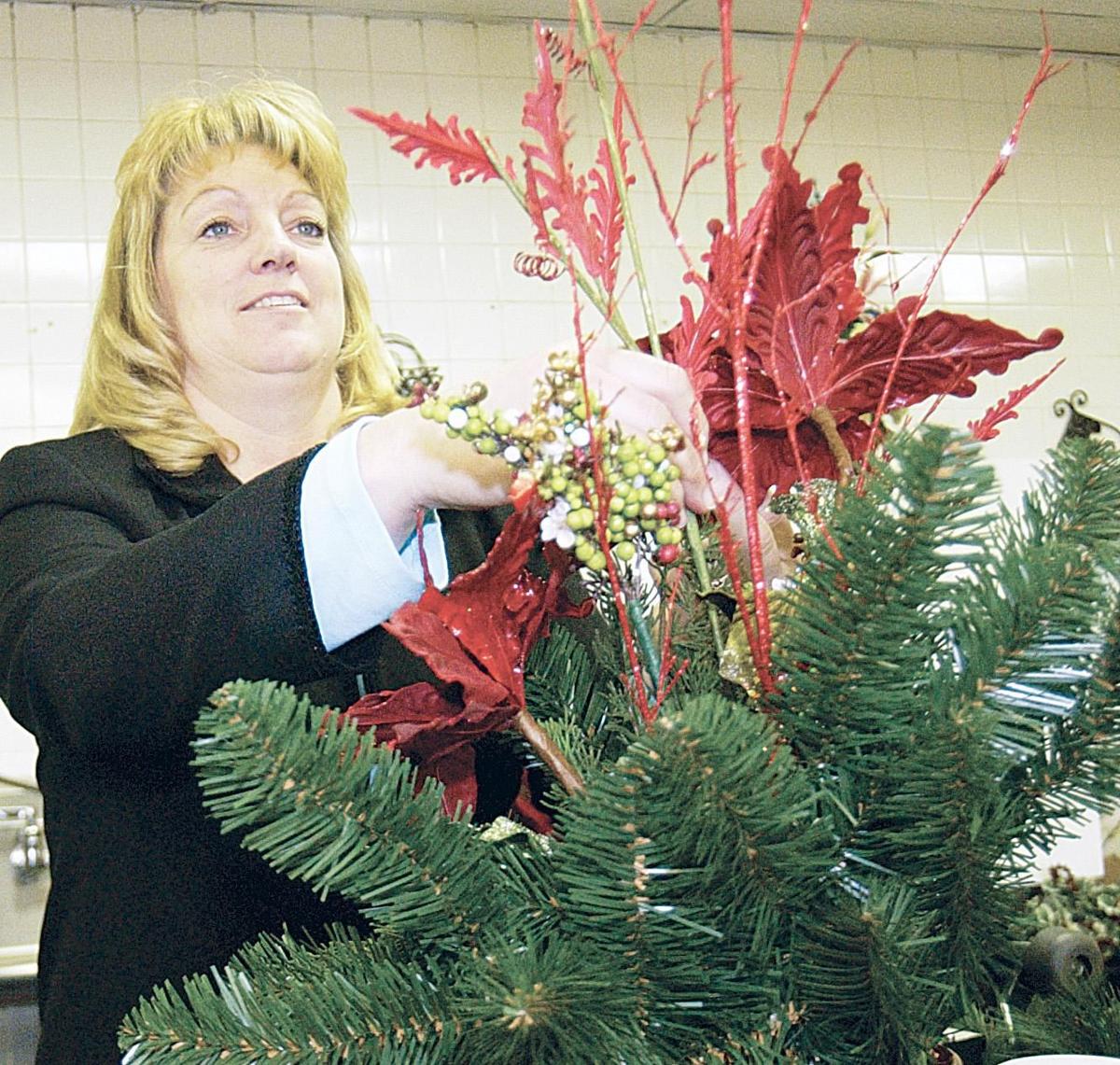 Christmas giving made with stitches, buttons and silk florals; shop