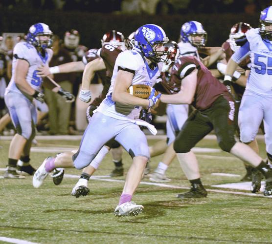 West Liberty falls to explosive Mustangs, still alive for football playoffs