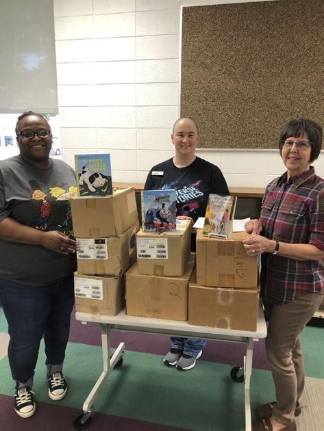Soroptimists donate books to library | News ...