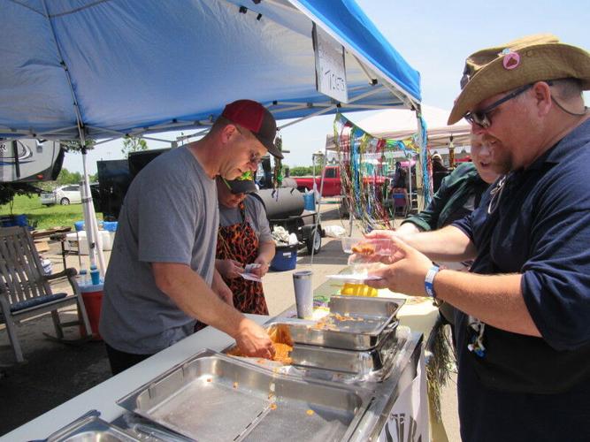 Patrons sample tasty chili, bbq at Cook-off