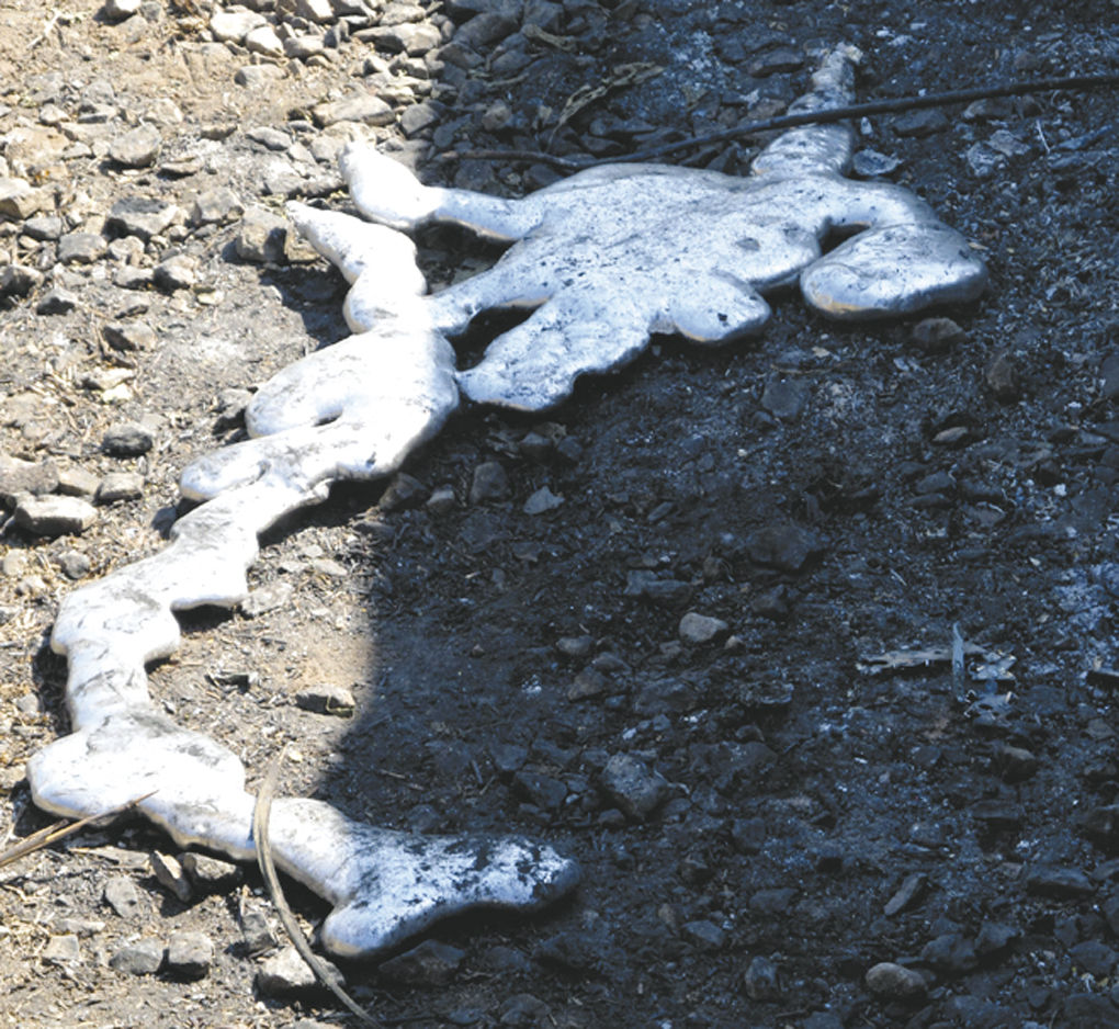 Body found in burnedout car News