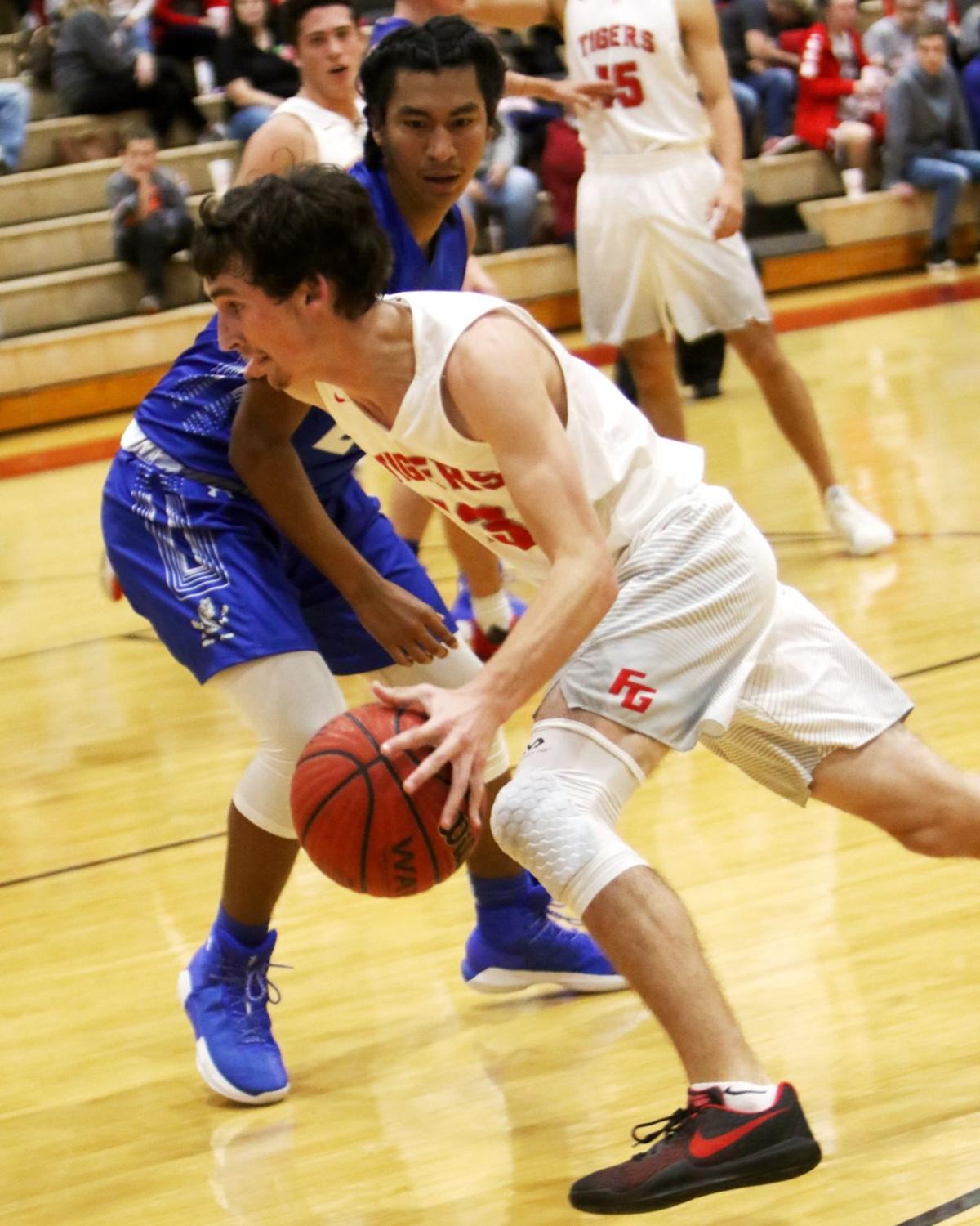Fort Gibson boys race by Miami; Lady Tigers cruise Local Sports