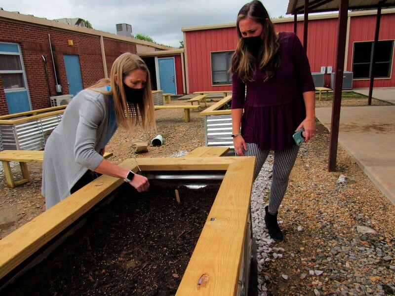 Oktaha Elementary students plant fall veggies Schools