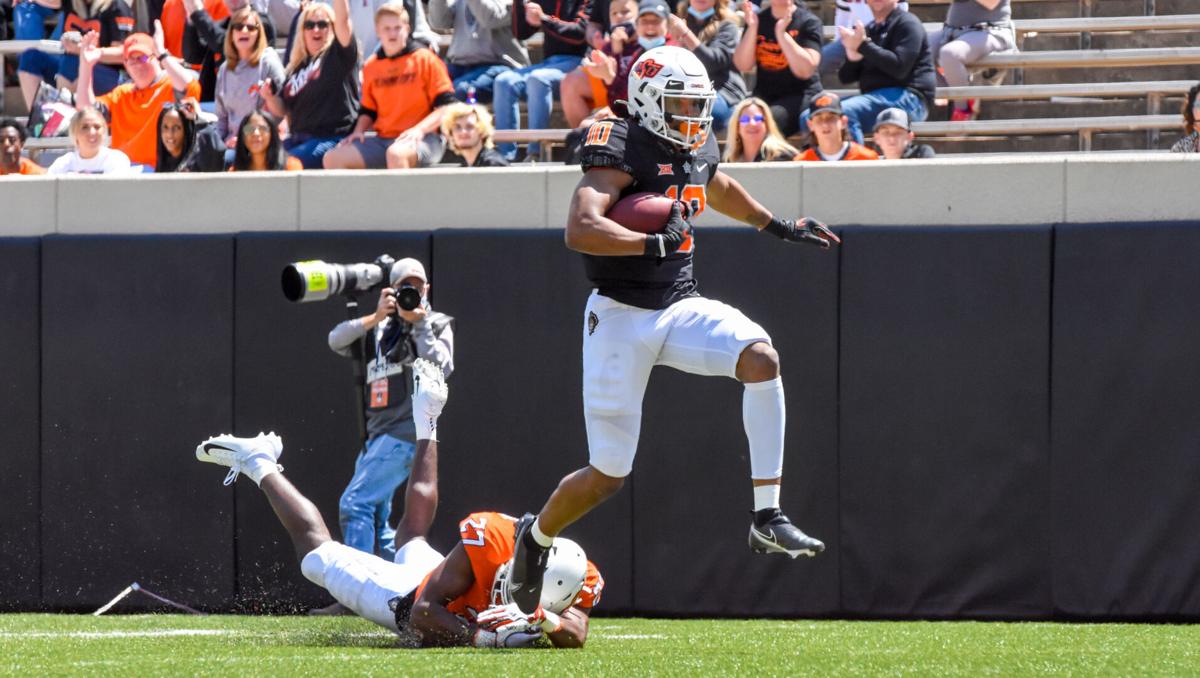 Owens skips into endzone.jpg
