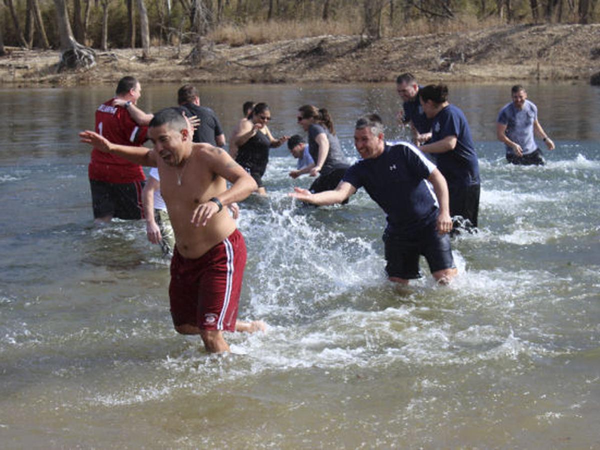 Cold plunge warms hearts, raises funds