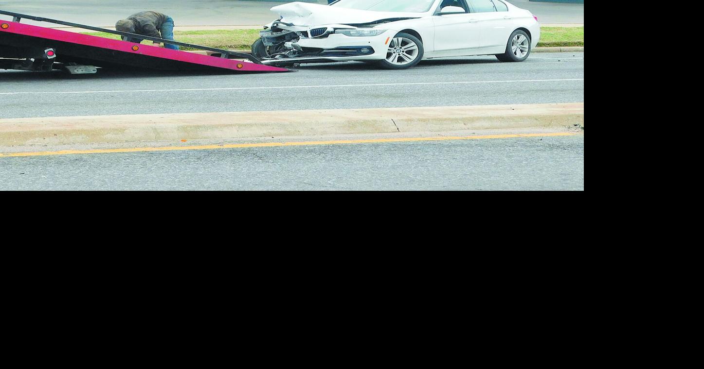 Three sent to hospital after two-car collision