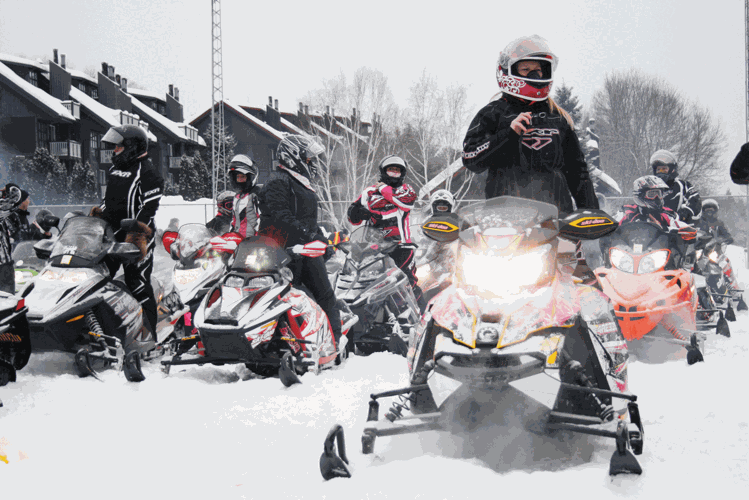 Pink snowmobiles revved for breast cancer patients
